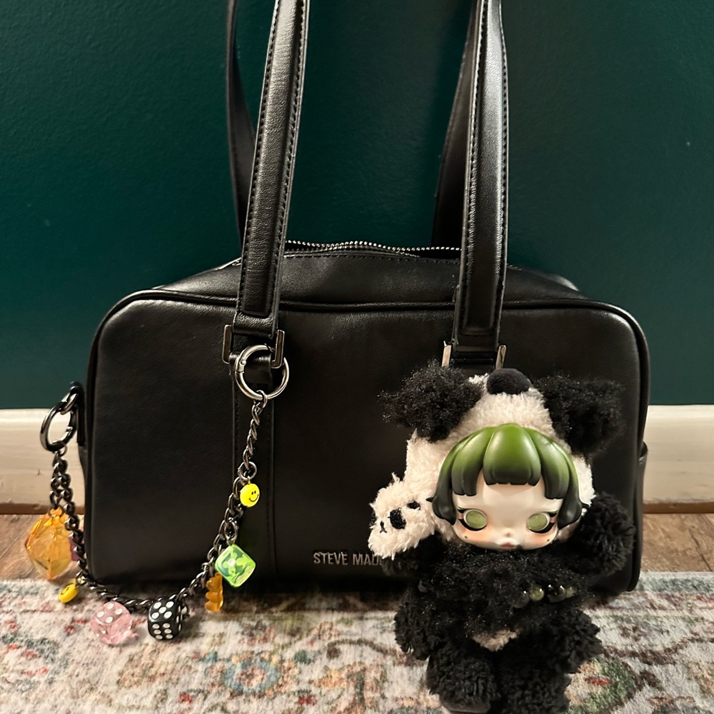 Steve Madden Black Handbag with Dice Charm and PopMart Lazy Skullpanda